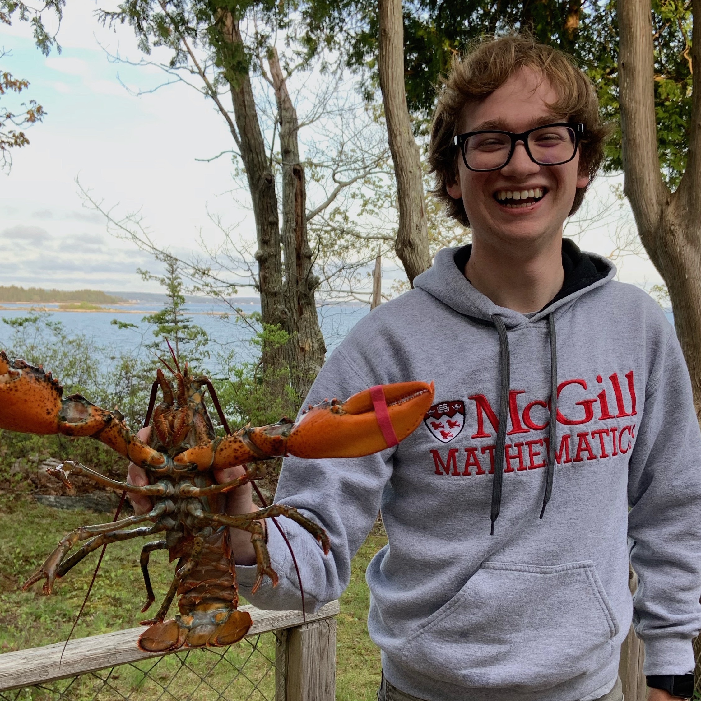 Jacksyn Bakeberg holding a lobster